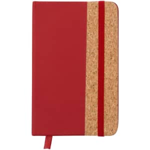 A red notepad with a cork panel and an elastic closure, featuring a ribbon bookmark.