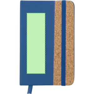 A notepad with a navy blue cover, cork detailing, and a green accent panel. It includes an elastic band and ribbon marker.