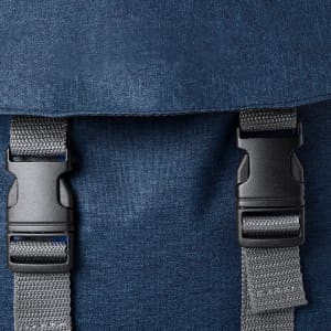 A blue backpack featuring grey straps and buckles, with a textured fabric finish and a logo on the front.