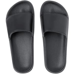 Black flip flops with a smooth strap and textured footbed, featuring a simple design and a logo.