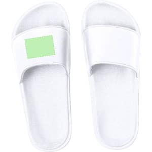 White flip flops with a green placeholder on the strap. The footwear features a simple design and includes branding.