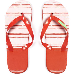 A pair of red and white striped flip flops featuring a logo on the straps.