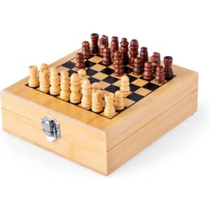 A wooden chess set with a checkered board and carved light and dark pieces in a wooden storage box.