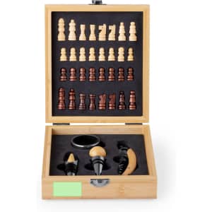 A wooden box set containing a chess set with light and dark pieces, along with wine accessories in black and natural wood.