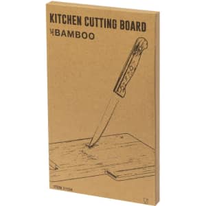 A bamboo kitchen cutting board packaged in a cardboard box with an illustration of a knife cutting into it.