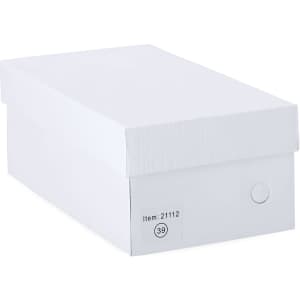 A white shoe box with a lid, featuring a circular label on the front.