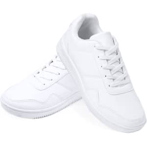 A pair of white trainers featuring a sleek design and lace-up front, with a logo on one side.