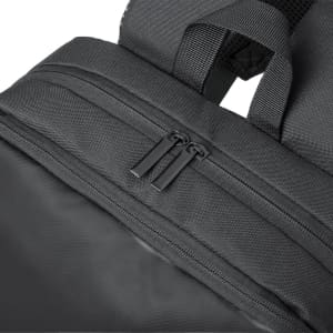 A black backpack featuring zippers and adjustable straps, with a textured surface and a logo.