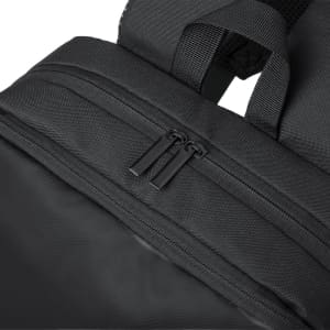 A black backpack featuring double zippered compartments and adjustable straps. Includes a branding logo.