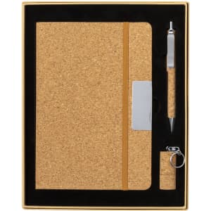 A cork notebook set featuring a notebook, pen, keychain, and a cardholder, all in natural tones.