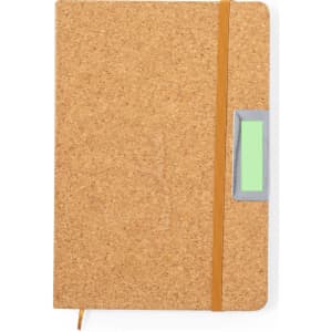 A cork-covered notebook with an orange elastic band and a grey and green label area.