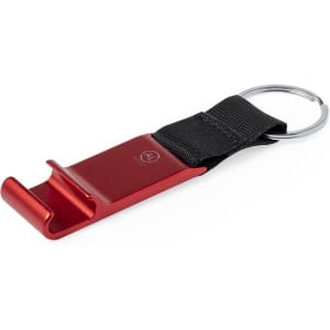 A red metal keyring holder with a black fabric strap and a circular keyring attachment. It features a logo.