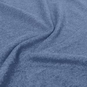 A close-up of a blue fabric, showcasing the texture and weave of the material used for the Bandul Kids T-Shirt.