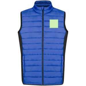 A blue soft shell vest with a quilted design and a contrasting black side panel, featuring a blank area for branding.