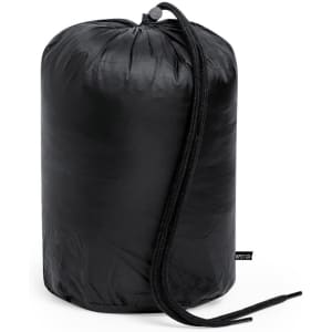 A black puffer jacket compressed into a cylindrical shape, featuring a drawstring closure.