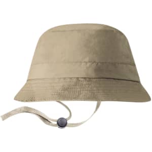 A beige bucket hat with a wide brim and an adjustable chin strap, featuring a logo on the side.