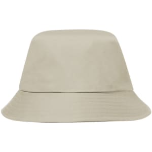 A beige bucket hat with a wide brim. The hat has a simple, clean design and features a logo.