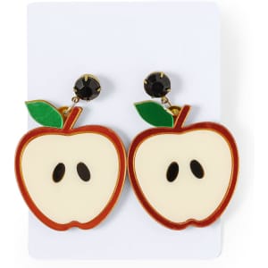 A pair of red and white apple-shaped earrings with black accents and green leaves, displayed on a card with a logo.