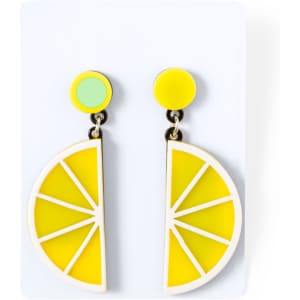 Bright yellow lemon slice earrings with a mint green circular accent, displayed on a white card. Includes a branding logo.