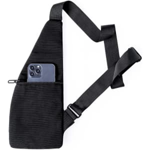 A black shoulder bag with a zippered pocket, featuring a phone partially visible inside the pocket.