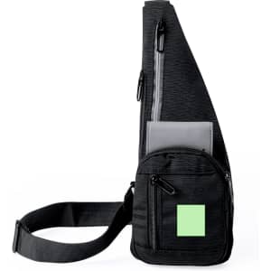 A black shoulder bag with multiple zippered pockets and a logo, featuring a unique angled design.