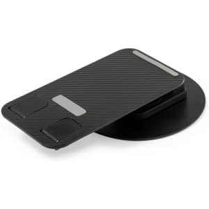 A black phone stand with a textured finish and two small grips, featuring a round base and a sleek design.