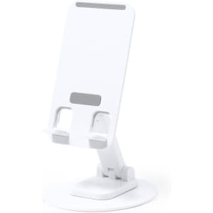 A white phone stand with a sleek design, featuring adjustable angles and a circular base. It has a logo on it.