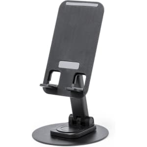 A black phone stand with a carbon fibre texture and adjustable base, featuring a simple design and a logo.