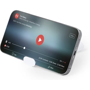 A smartphone on a white stand, displaying a video player interface with a play button and progress bar.