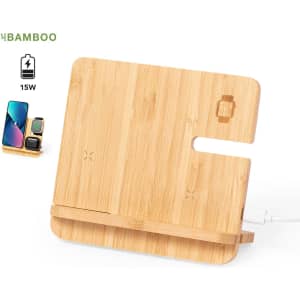A bamboo wireless charger with a sleek design, featuring a slot for charging devices and a subtle logo.