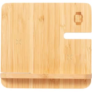 A wireless charger featuring a bamboo design, with a slot for a phone and a small logo on the surface.