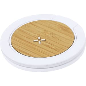 A round wireless charger with a bamboo surface and a white base, featuring a small logo in the centre.