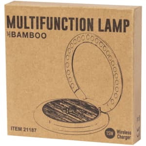 A brown cardboard box featuring a circular multifunction lamp design and a wireless charger. The box has a logo.