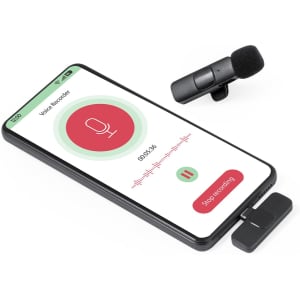 A black microphone beside a smartphone displaying a voice recorder app with a red circular recording button.