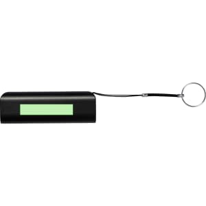 A black power bank with a keychain attachment and a light green rectangular panel.