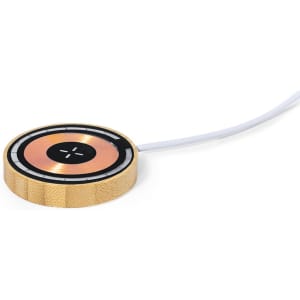 A wireless charger with a circular design, featuring a wooden base and a multi-coloured charging surface.
