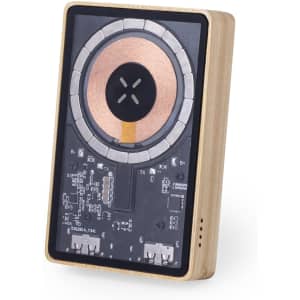 A wooden power bank featuring a sleek design and a wireless charging area in the centre. It has a logo on the surface.