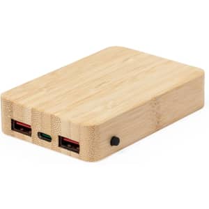 A bamboo power bank in a rectangular shape with two USB ports and a USB-C port, featuring a minimalist design.