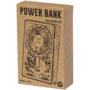 A cardboard box containing a bamboo power bank, featuring a circular design and electronic circuitry illustration.