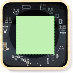 A square wireless charger with a bamboo frame and a black circuit board design featuring various electronic components.