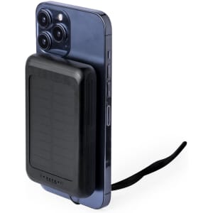 A black power bank attached to a smartphone, featuring a sleek design with a textured surface and a cable.