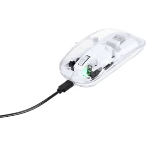 A transparent computer mouse with visible internal components and a black USB cable. It features a green light indicator.