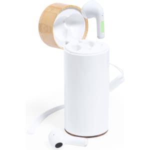 A white power bank with bamboo detailing, featuring wireless earphones resting beside it.