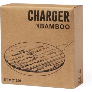 A wireless charger in a circular shape, packaged in a natural-coloured box with a bamboo finish and a logo.