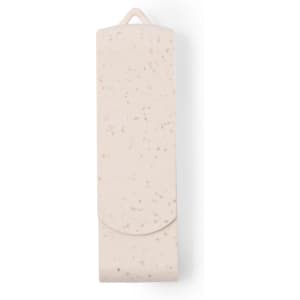 A beige USB memory drive in a smooth case, featuring a textured speckled design and a hang tab.