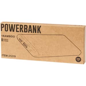 A power bank in a cardboard packaging, featuring a bamboo and wheat straw design, with two USB ports.