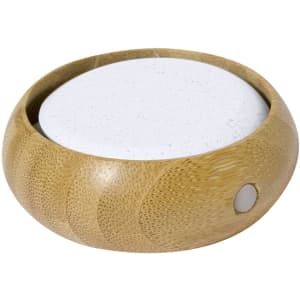 A bamboo coasters with a smooth white surface and a small circular button on the side.