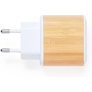 A USB charger with a bamboo-style wooden casing and white accents, featuring two prongs for plugging in.