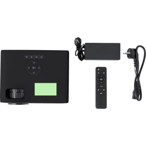 A black projector with a remote, power adapter, and cables included. It features various control buttons on the top.