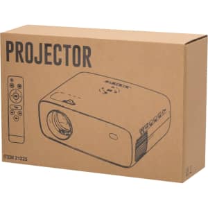 A beige projector in a cardboard box featuring a remote control and an illustrative design on the packaging.